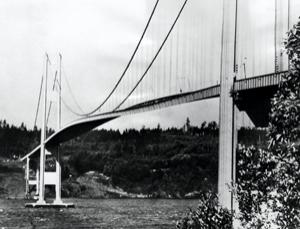 Tacoma Narrows Bridge, bijgenaamd Galloping Gertie, trilt hevig ten gevolge van de wind. (Bron: New Scientist)