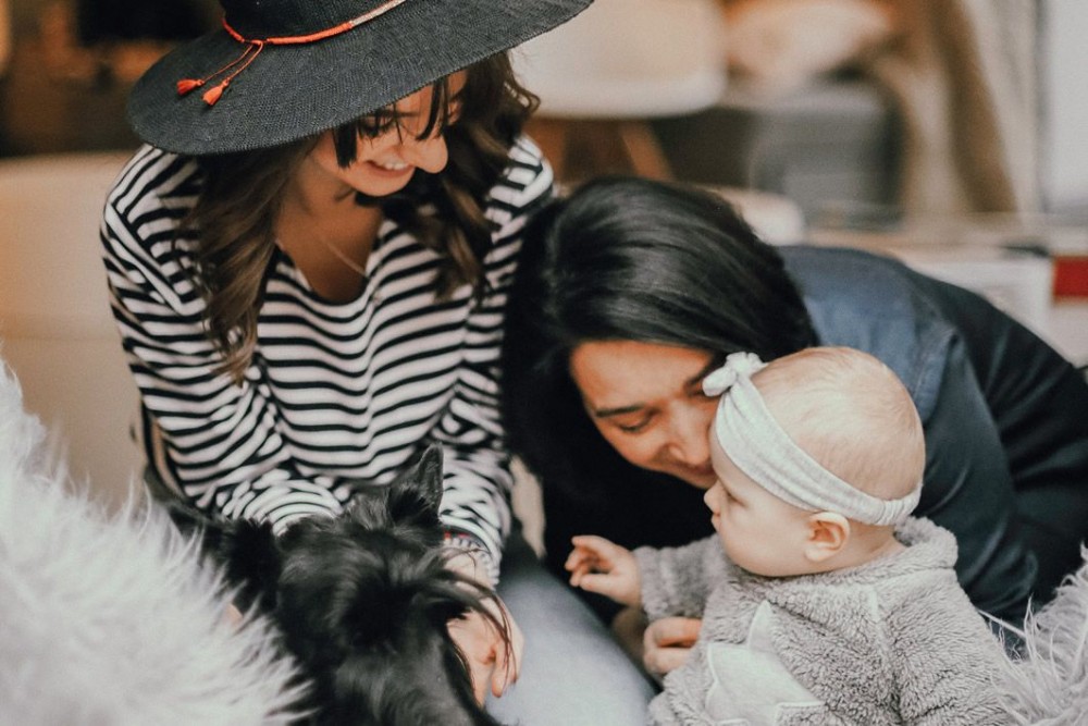 Two women with a toddler